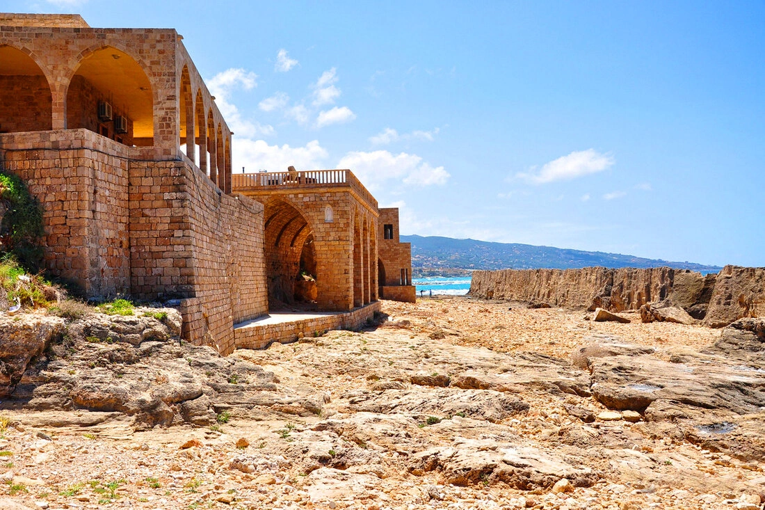 Waves breaking along the ancient Phoenician sea wall in Batroun, Lebanon