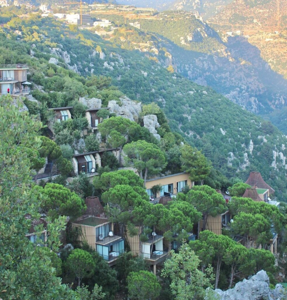 Mountain chalets and pine-covered hillsides in the village of Feytroun in Keserwan